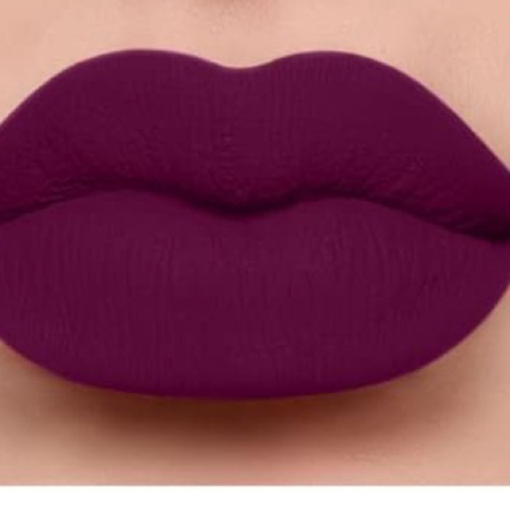 Deep burgundy lipstick